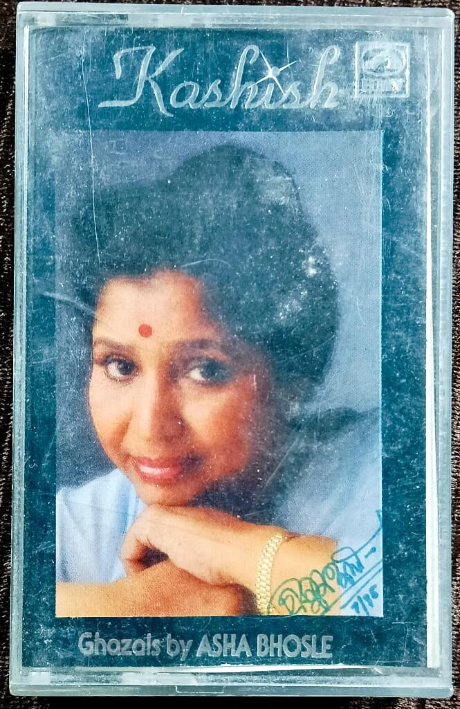Asha Bhosle – Kashish Ghazals From Umrao Jaan And Kashish By Asha Bhosle (1988) Nazar Hussain, Master Abdullah Pre-Owned HMV Audio Cassette