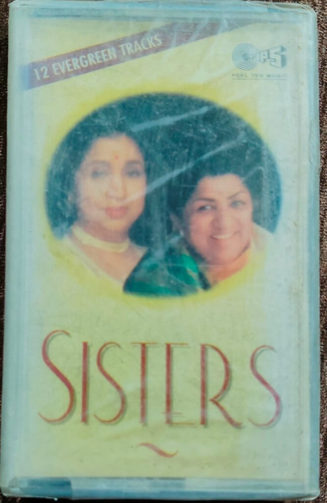 Lata Mangeshkar & Asha Bhosle – Sisters (1999) Compilation Pre-Owned Tips Audio Cassette