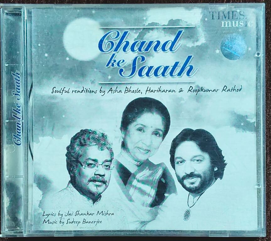 Chand Ke Saath - Soulful renditions by Asha Bhosle, Hariharan & Roopkumar Rathod (2009) Music – Sudeep Banerjee & Lyrics – Jai Shankar Mishra - Music Album Pre-Owned Times Music Audio CD