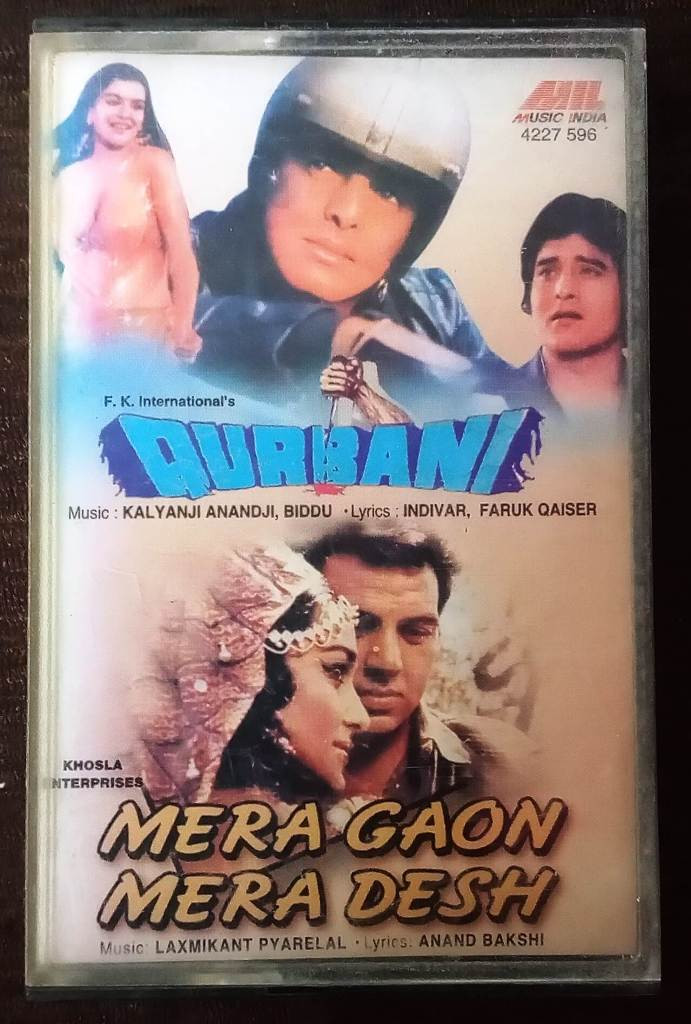 Qurbani (1980) Kalyanji Anandji & Biddu / Mera Gaon Mera Desh (1971) Laxmikant-Pyarelal Pre-Owned Music India Audio Cassette